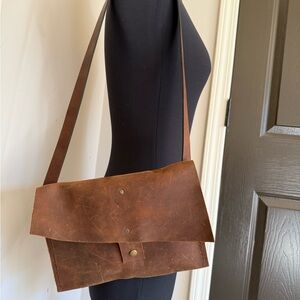 Raw leather artisan satchel